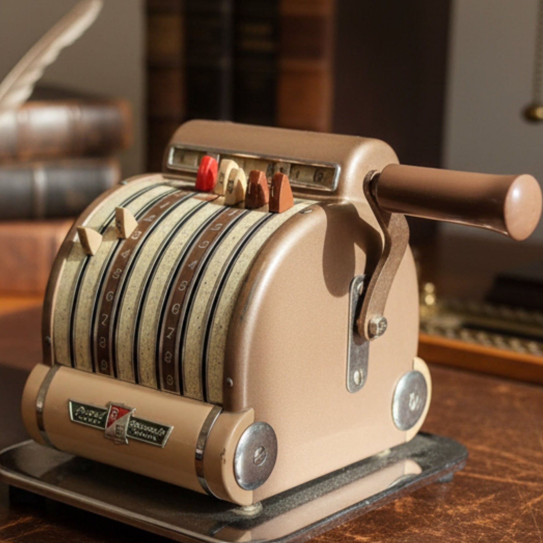 Vintage cheque marking register on an antique leather-topped desk