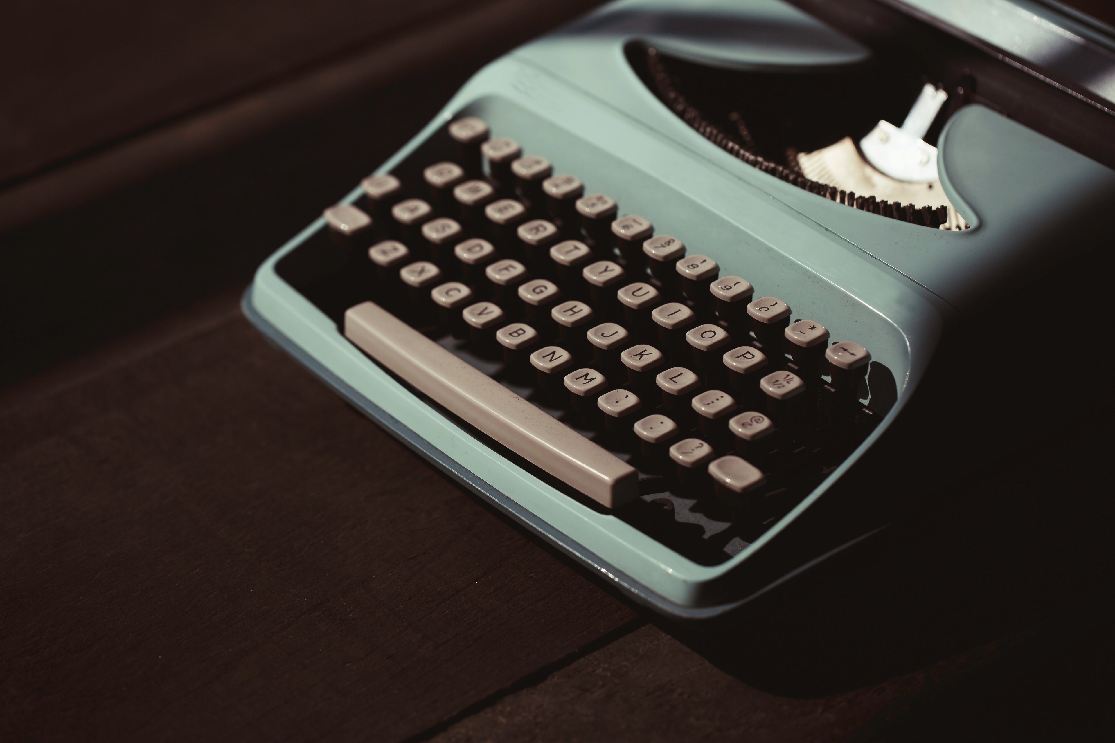 An eye-catching turquoise vintage typewriter  